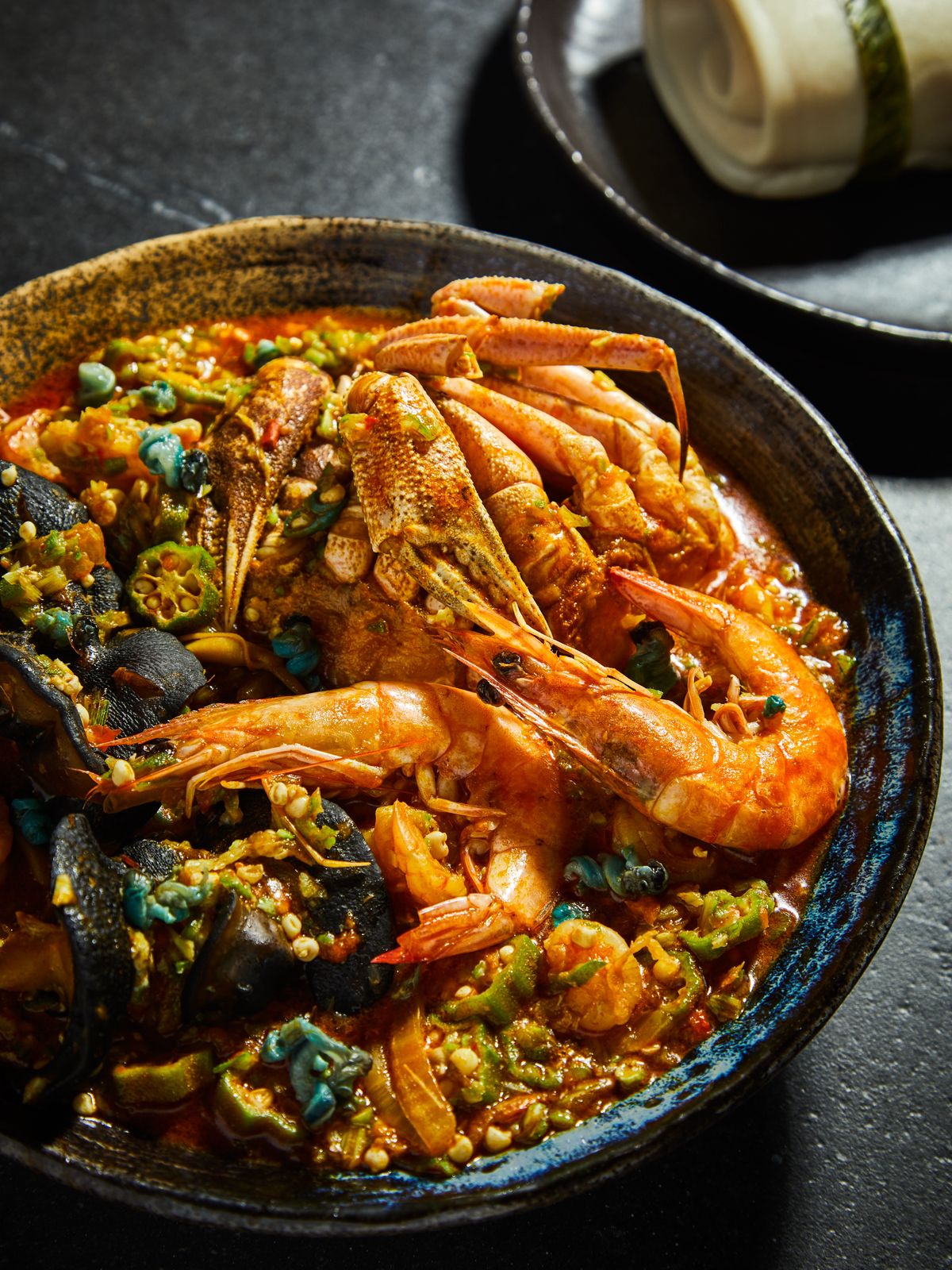 Seafood okra with prawns, calamari and vegetables in a light sauce